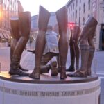 John Wooden Statue From Behind 1000x750 1 150x150